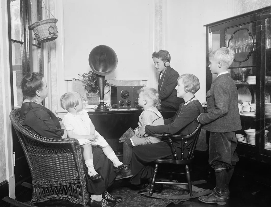A family around the radio, 1920s
